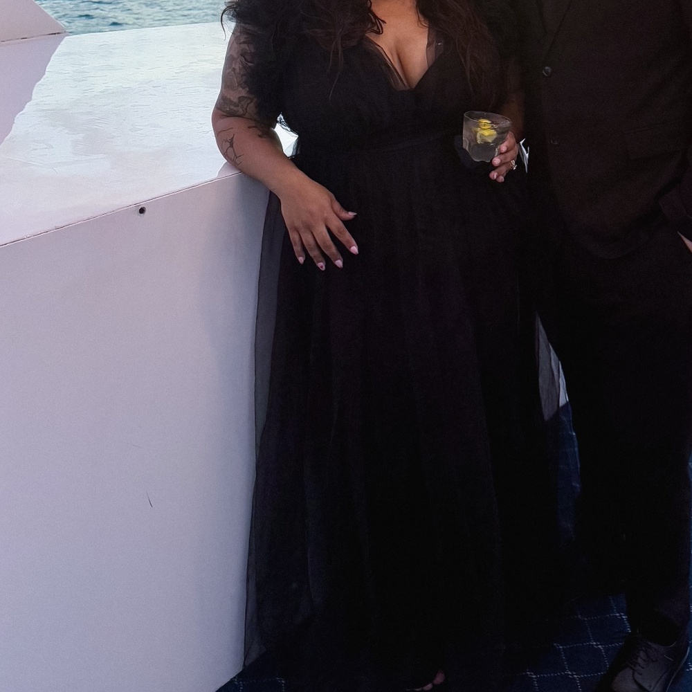 Black ruffle sleeve dress